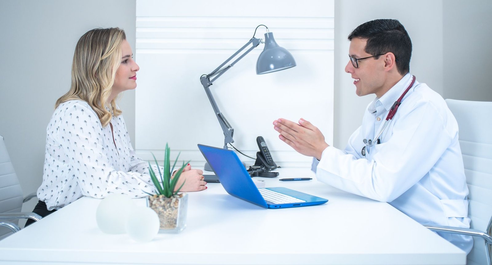 Veteran speaking with a staff member as part of the VA patient advocate program