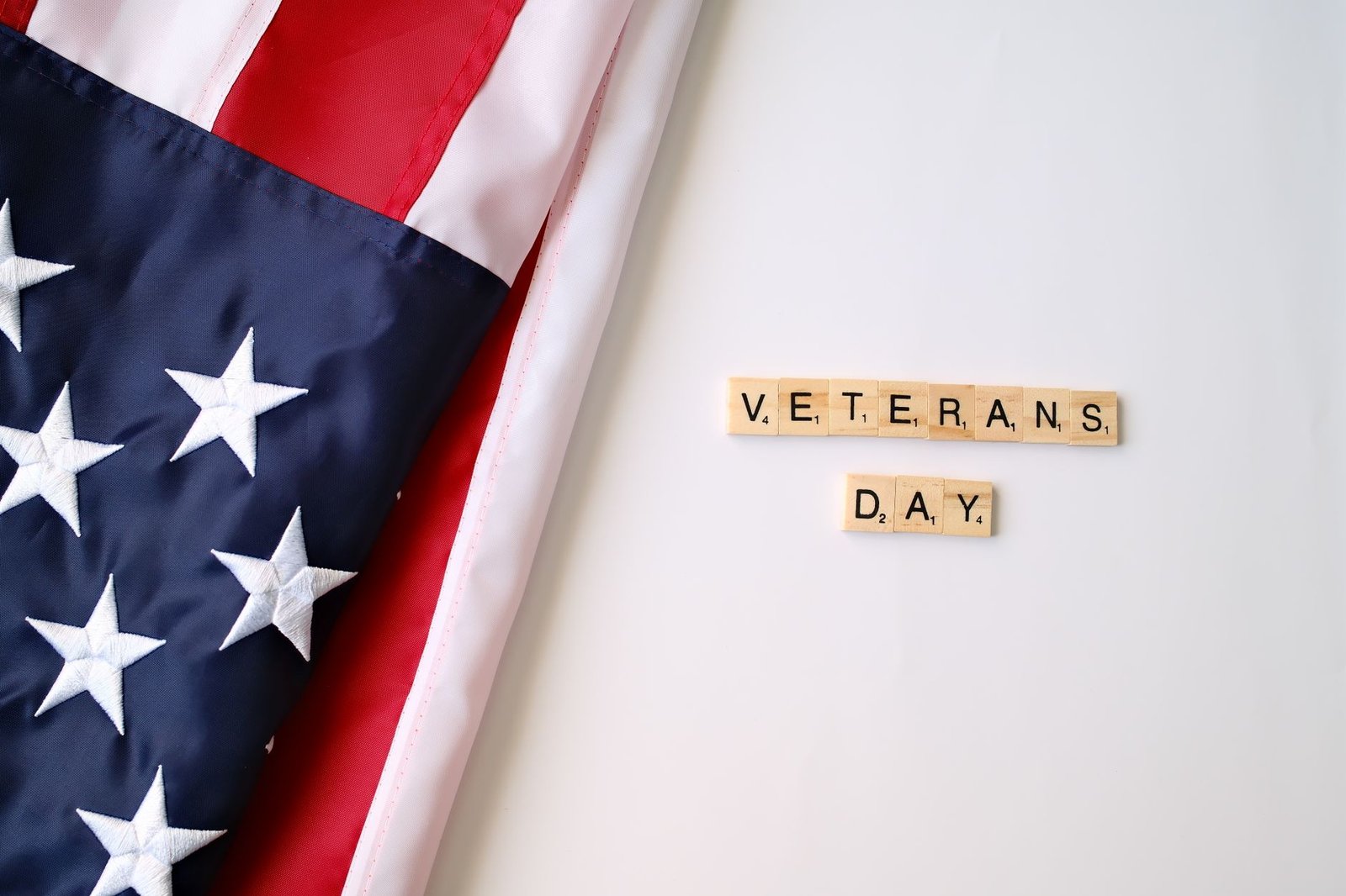 Framed service photo and folded flag representing a veteran's damage controlman asbestos exposure history