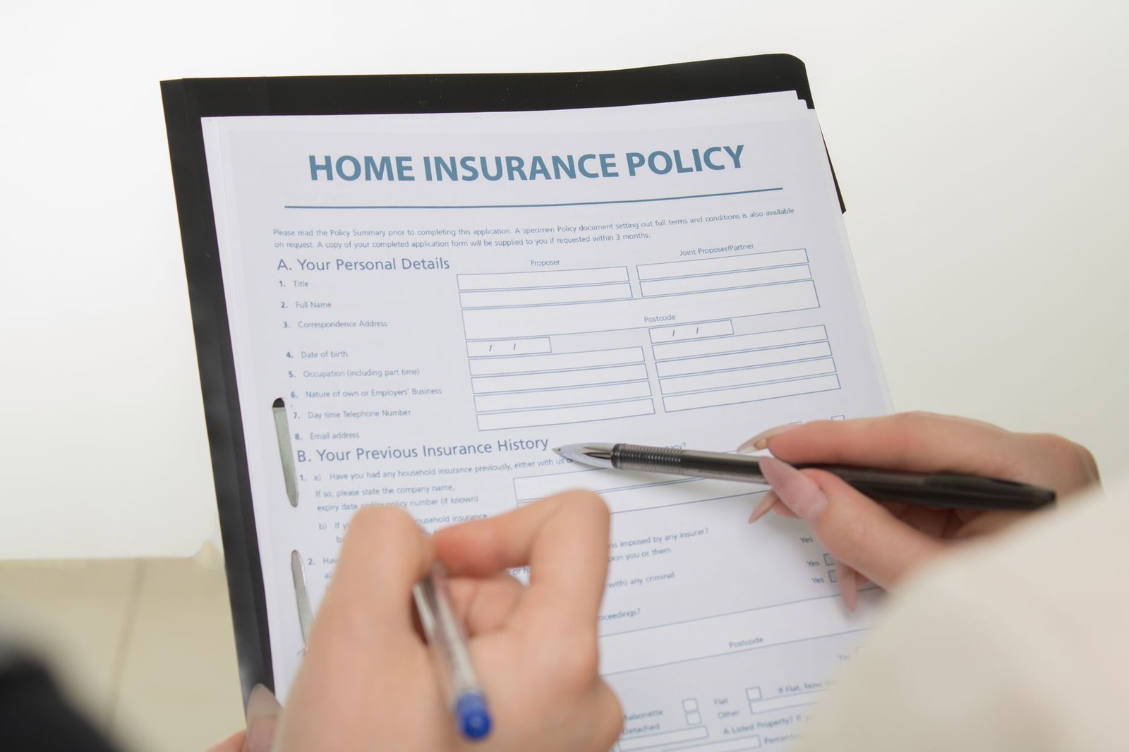 Close-up of hands completing paperwork connected to a VA disability severance pay offset case