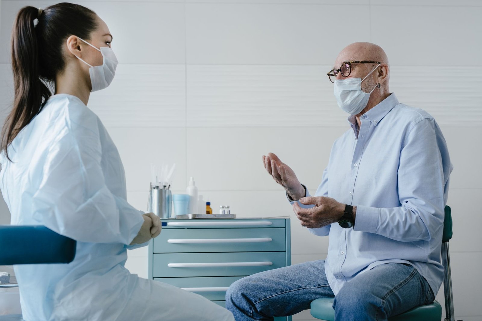 Veteran discussing VA smoking cessation programs for veterans with a VA primary care provider