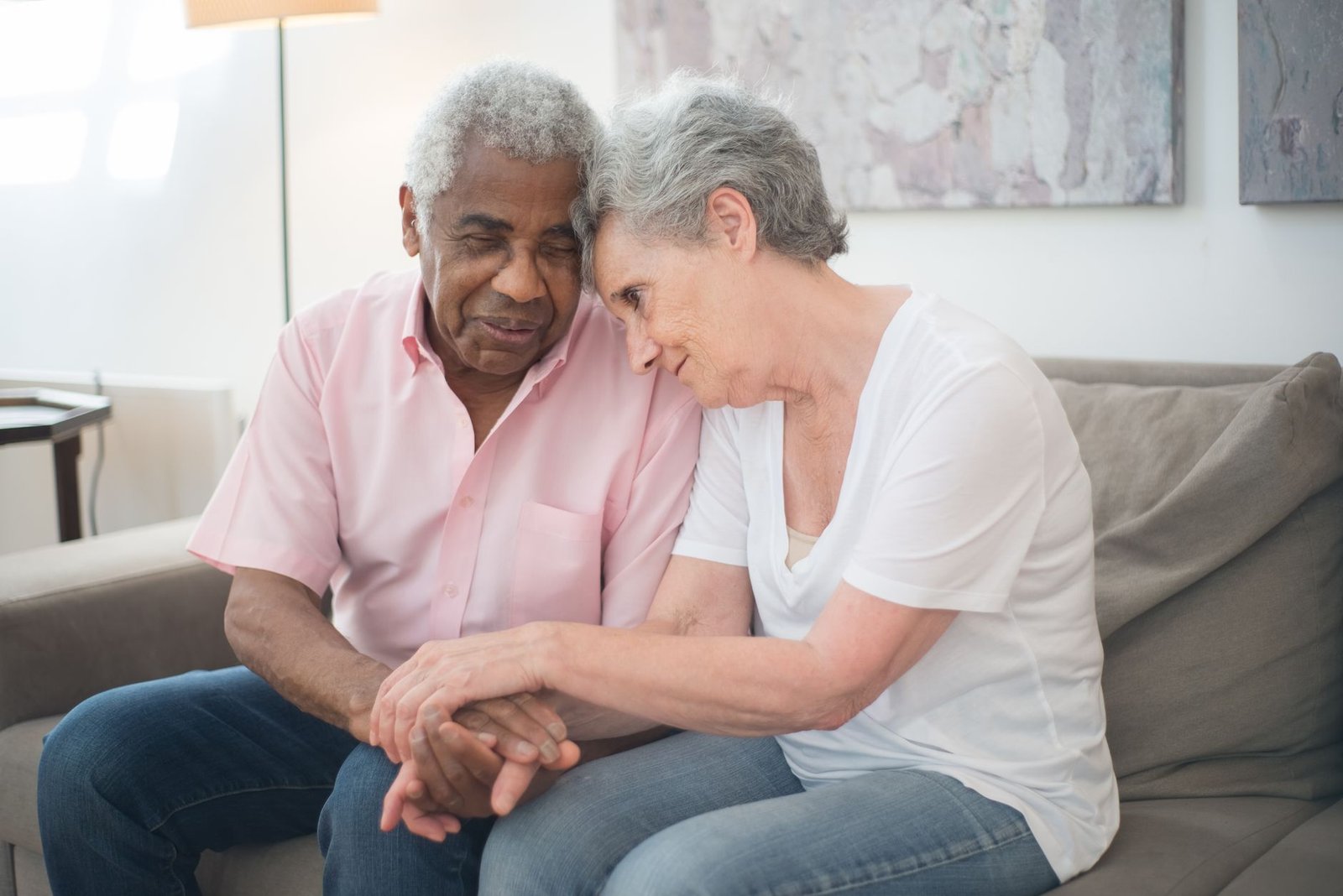 Surviving spouse receiving bereavement counseling for military families at a quiet home visit